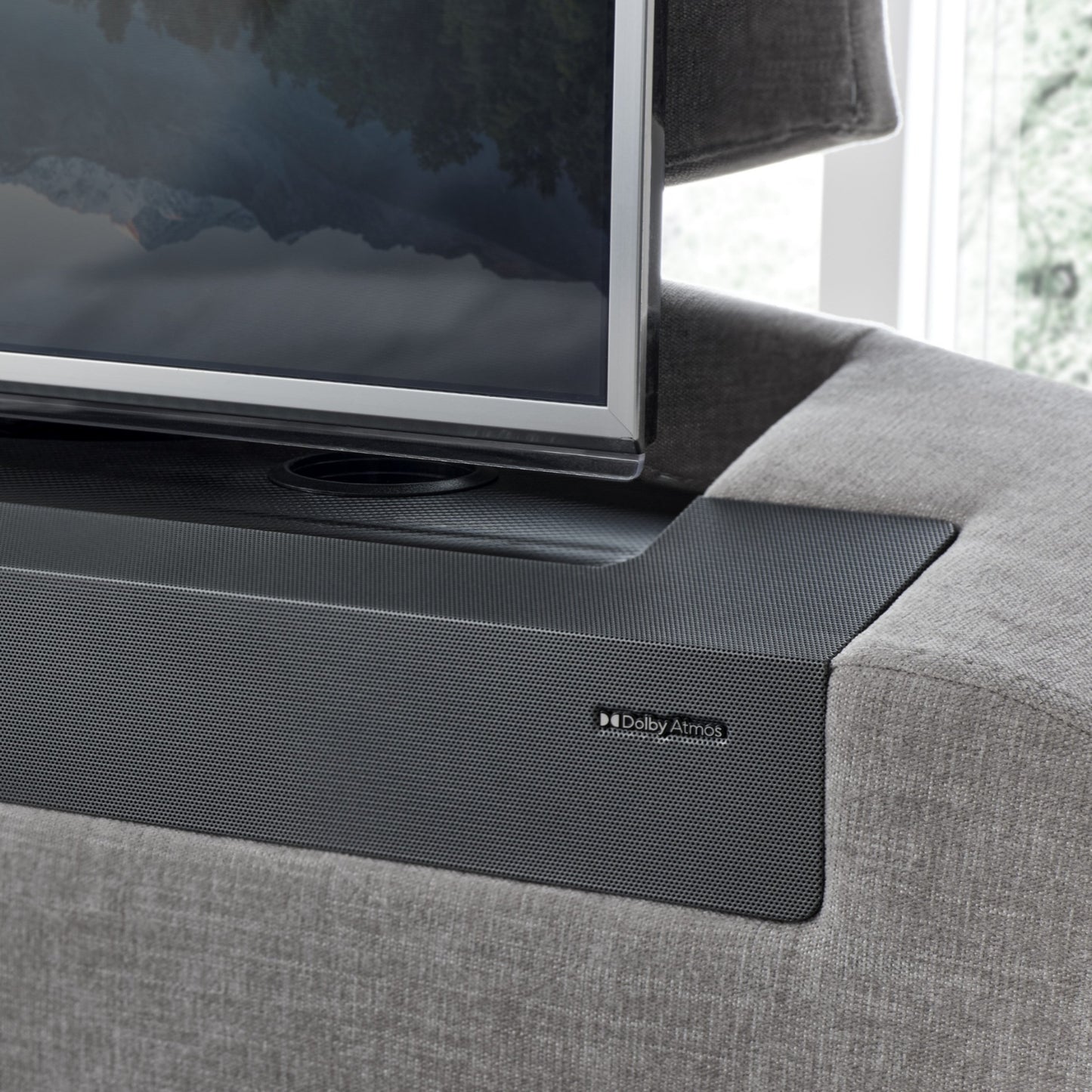 TV Bed with Dolby Atmos logo on a Ottoman Bed
