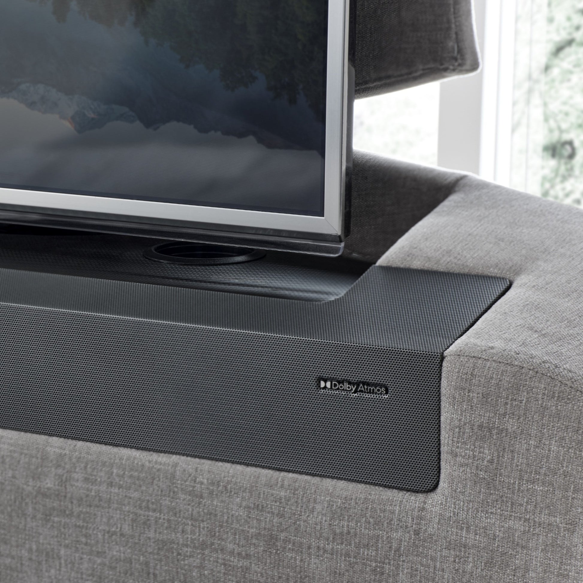 TV Bed with Dolby Atmos logo on a Ottoman Bed